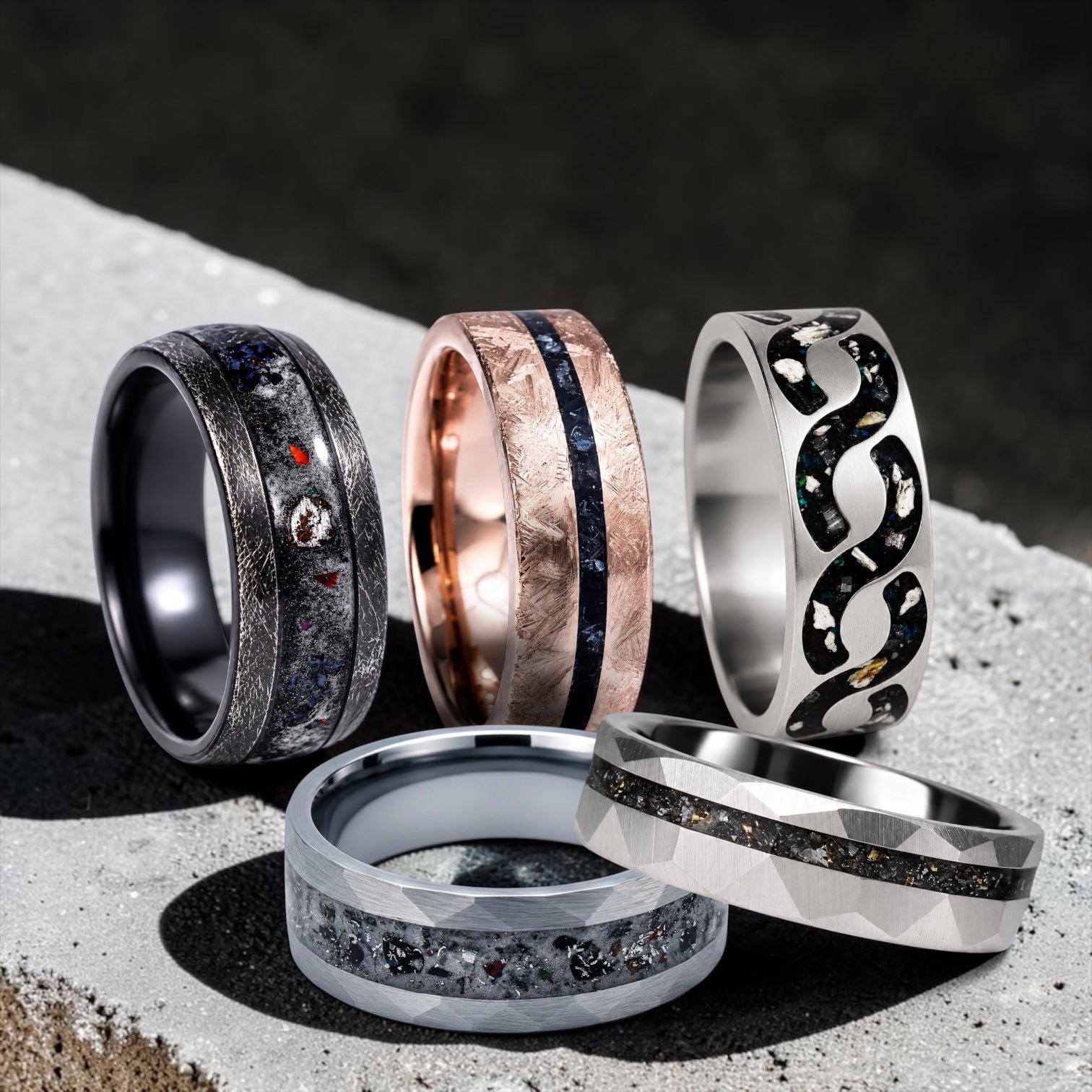 Rugged rings featuring meteorite, fossils, lava rock, and distressed metal finishes.