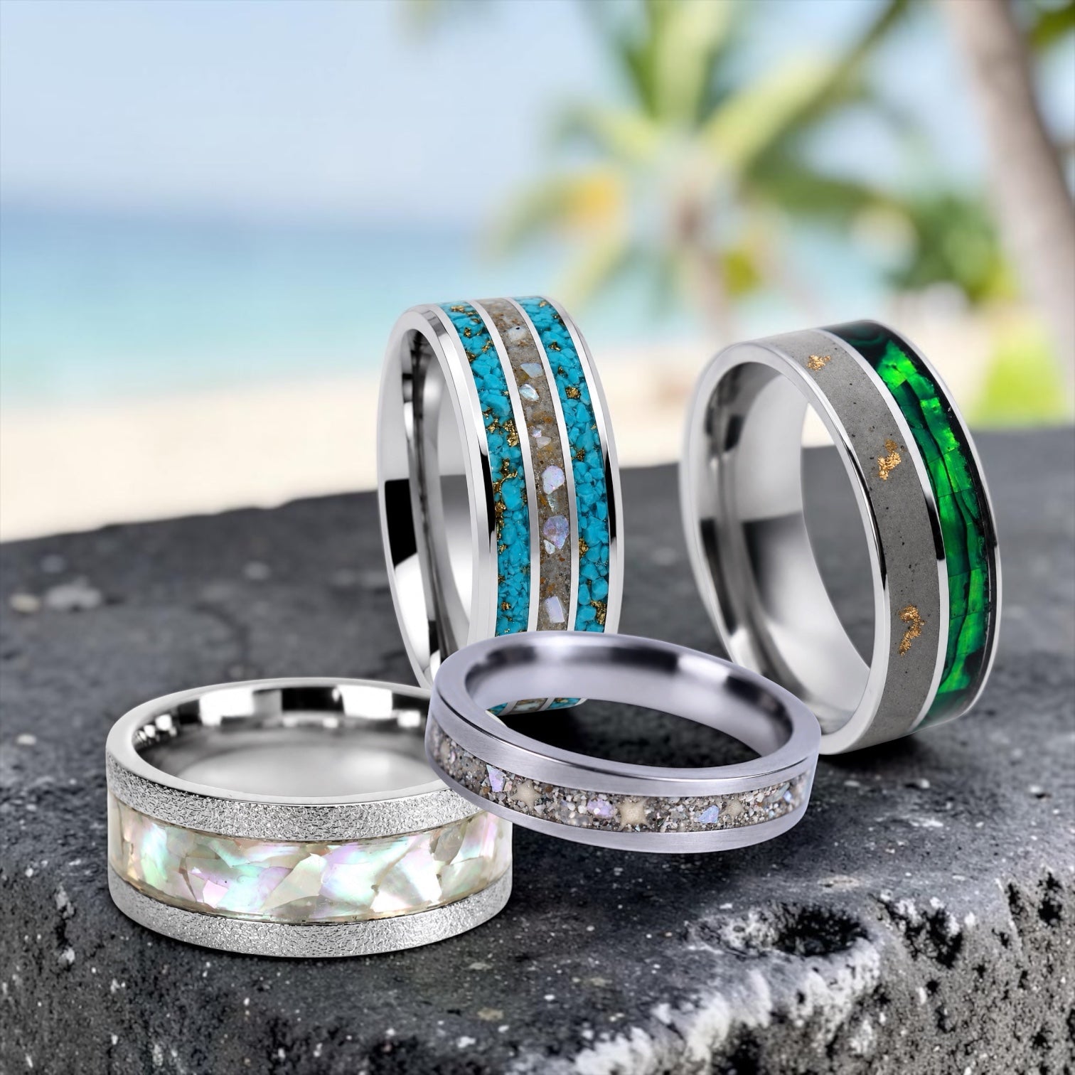 Ocean-inspired rings featuring beach sand, sea glass, shells, and coastal elements.