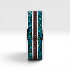 Tungsten ring with chrysocolla and cinnabar inlay featuring bold blue and red tones, polished band with textured design