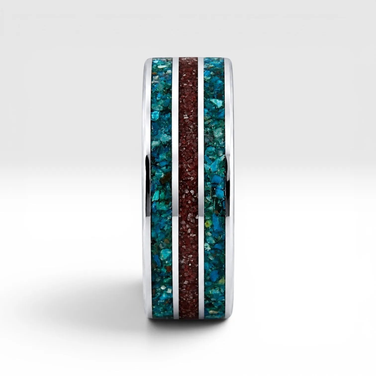 Tungsten ring with chrysocolla and cinnabar inlay featuring bold blue and red tones, polished band with textured design