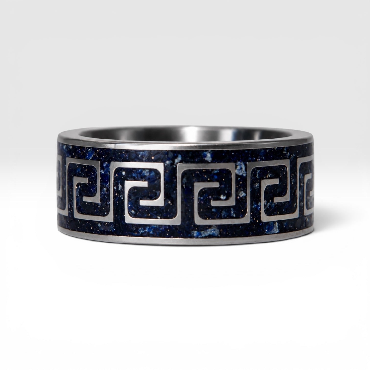 Titanium Greek key ring with blue goldstone and silver leaf inlay, geometric design with deep blue shimmer