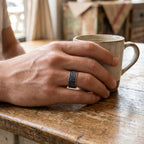 Titanium Greek key ring with blue goldstone and silver leaf inlay, geometric design with deep blue shimmer
