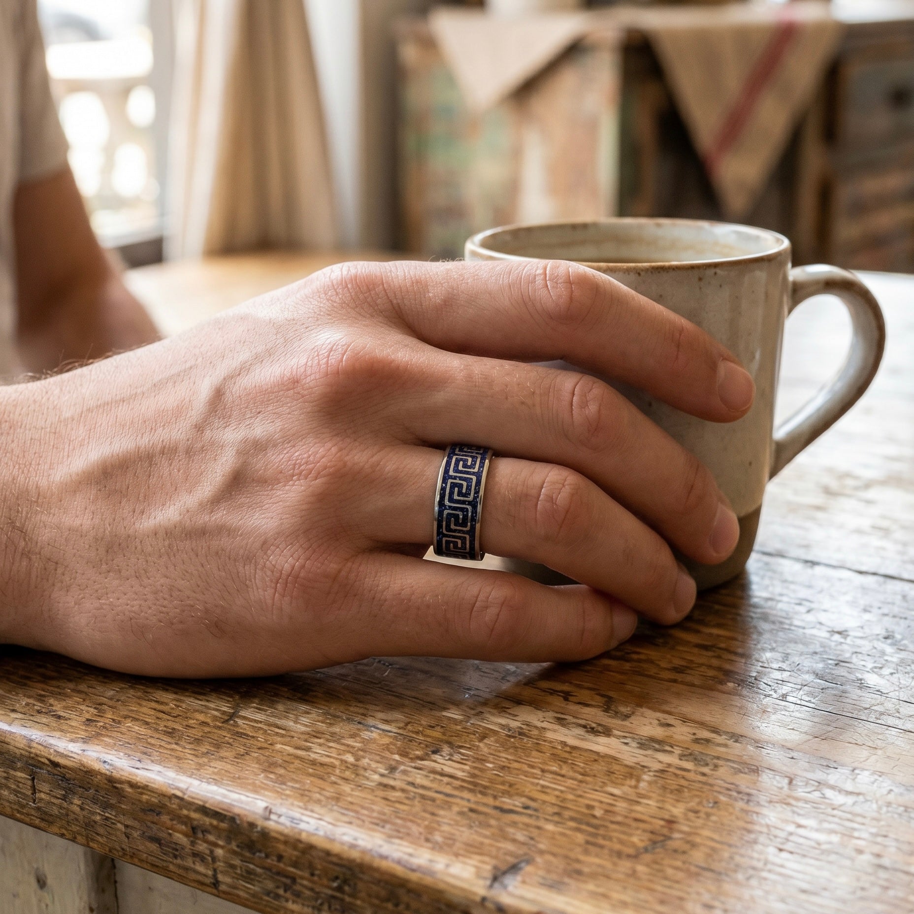 Titanium Greek key ring with blue goldstone and silver leaf inlay, geometric design with deep blue shimmer