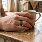 Titanium Greek key ring with blue goldstone and silver leaf inlay, geometric design with deep blue shimmer