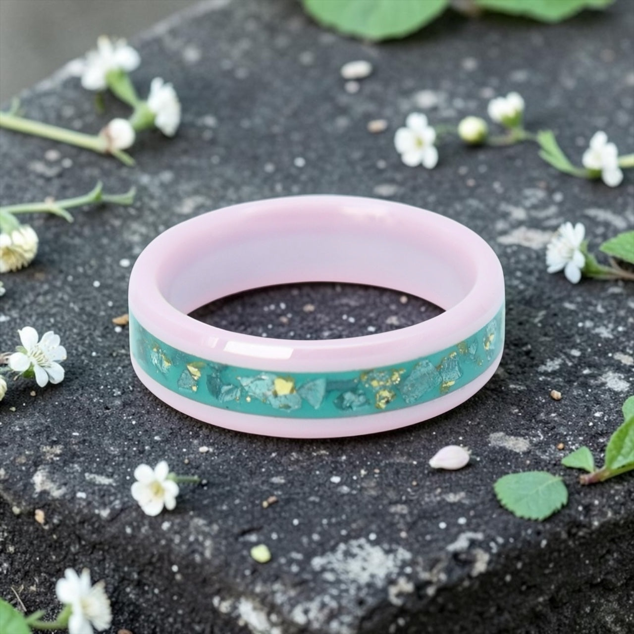 Pink ceramic ring with teal sea glass and gold leaf inlay, smooth polished band with ocean inspired design