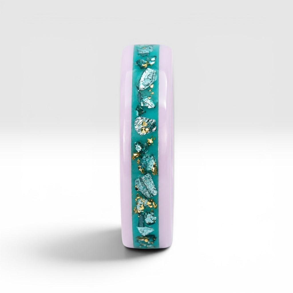 Pink ceramic ring with teal sea glass and gold leaf inlay, smooth polished band with ocean inspired design