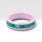 Pink ceramic ring with teal sea glass and gold leaf inlay, smooth polished band with ocean inspired design