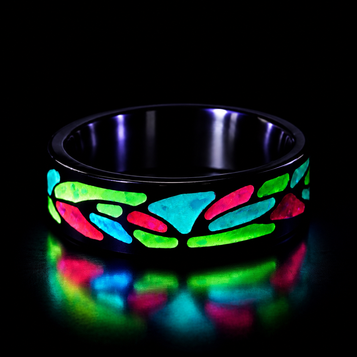 Arcadia titanium ring featuring a colorful abstract inlay with multi-color glow-in-the-dark elements inspired by retro arcade aesthetics.