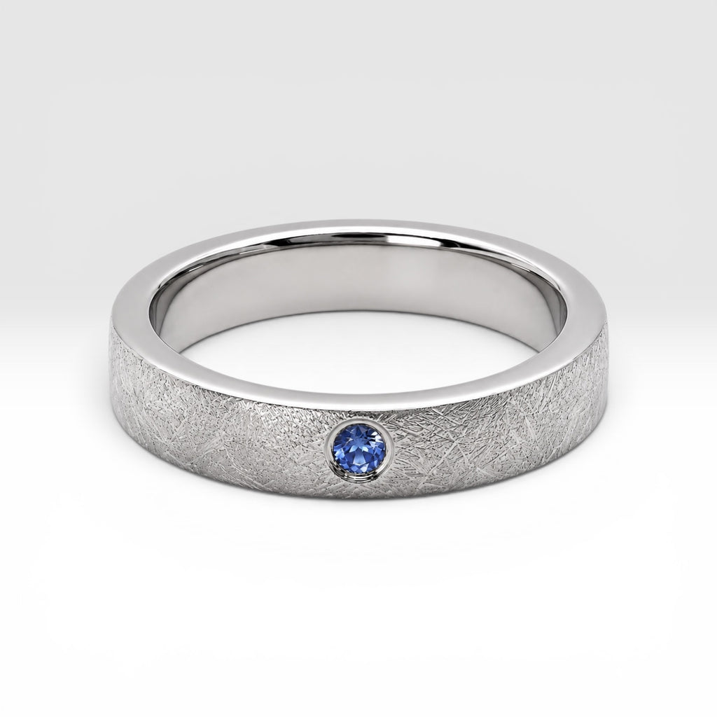 Sterling silver ring with flush set blue topaz and meteorite texture, minimalist handcrafted wedding 