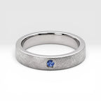 Sterling silver ring with flush set blue topaz and meteorite texture, minimalist handcrafted wedding 
