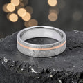Sterling silver ring with rose gold offset inlay and meteorite texture, minimalist handcrafted wedding band