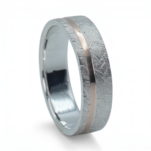 Sterling silver ring with rose gold offset inlay and meteorite texture, minimalist handcrafted wedding band
