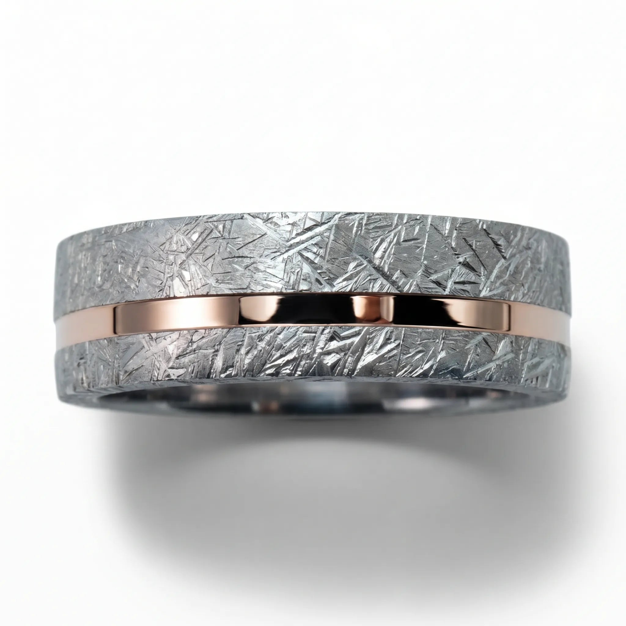 Sterling silver ring with rose gold offset inlay and meteorite texture, minimalist handcrafted wedding band