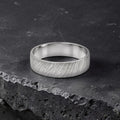 Sterling silver ring with meteorite inspired rugged texture, minimalist handmade unisex band