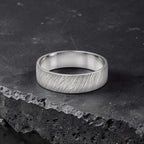 Sterling silver ring with meteorite inspired rugged texture, minimalist handmade unisex band