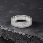 Sterling silver ring with meteorite inspired rugged texture, minimalist handmade unisex band