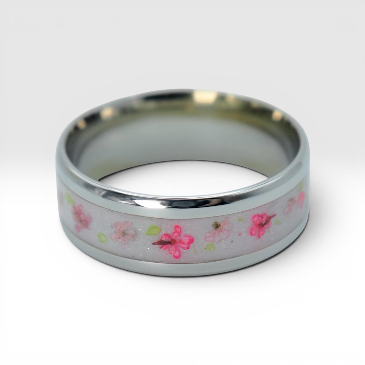Cobalt ring with real pressed flowers and shimmering inlay, polished band with nature inspired design