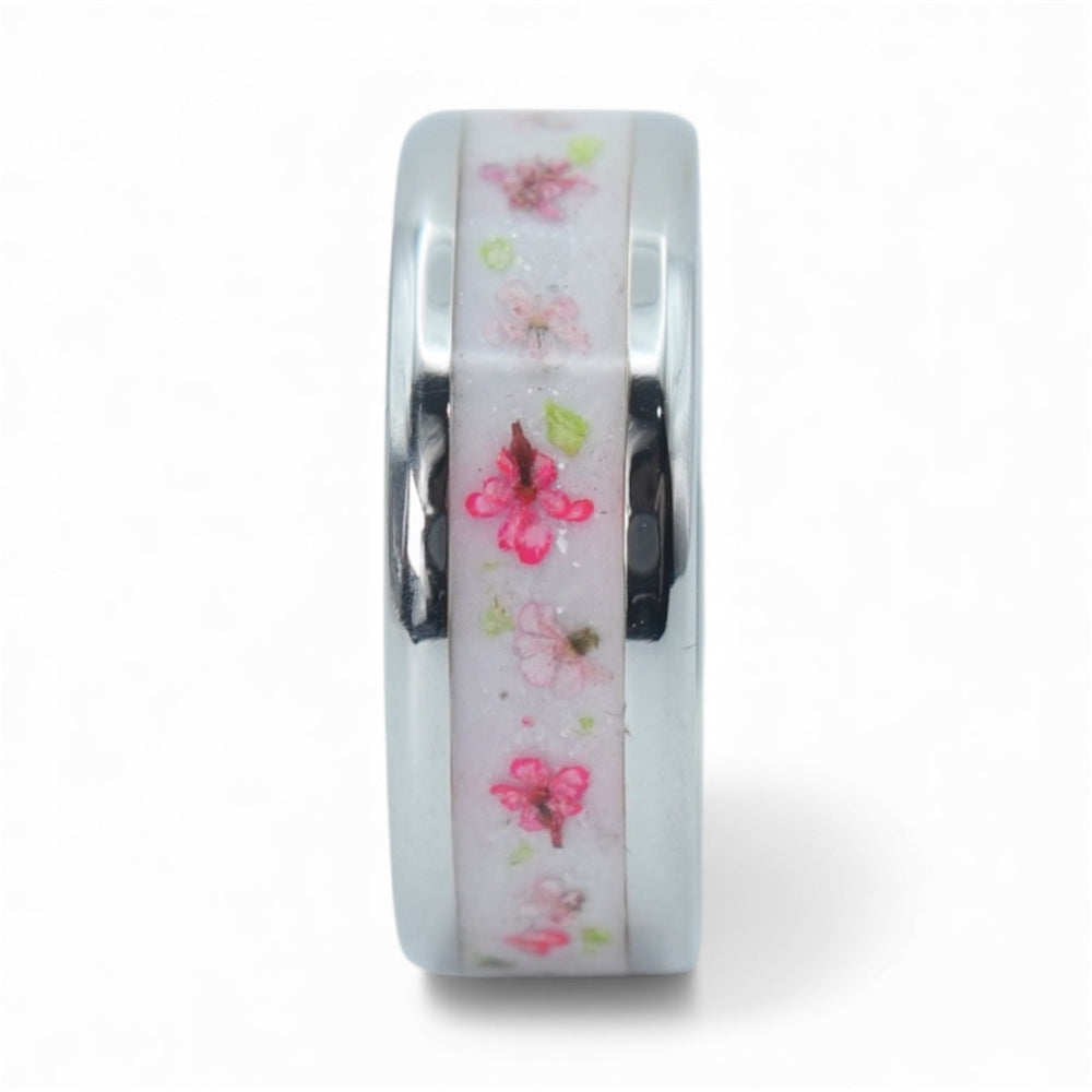 Polished cobalt band with preserved flowers in resin and subtle shimmer creating a soft natural composition