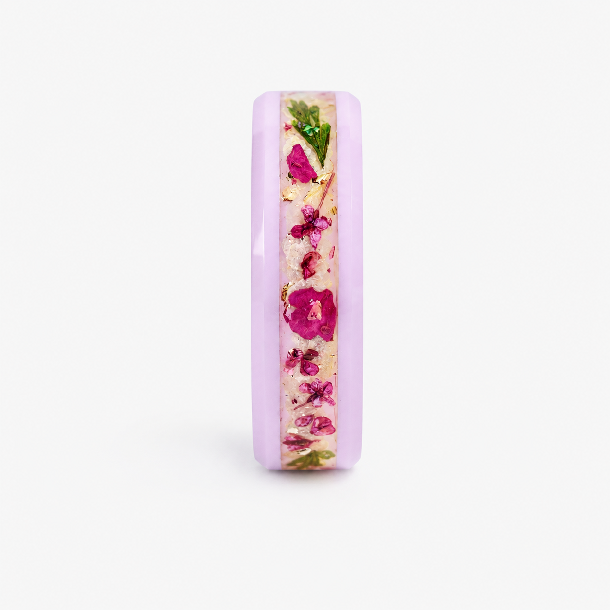 Blosselle pink ceramic ring featuring real pressed flowers preserved in a handcrafted floral inlay.