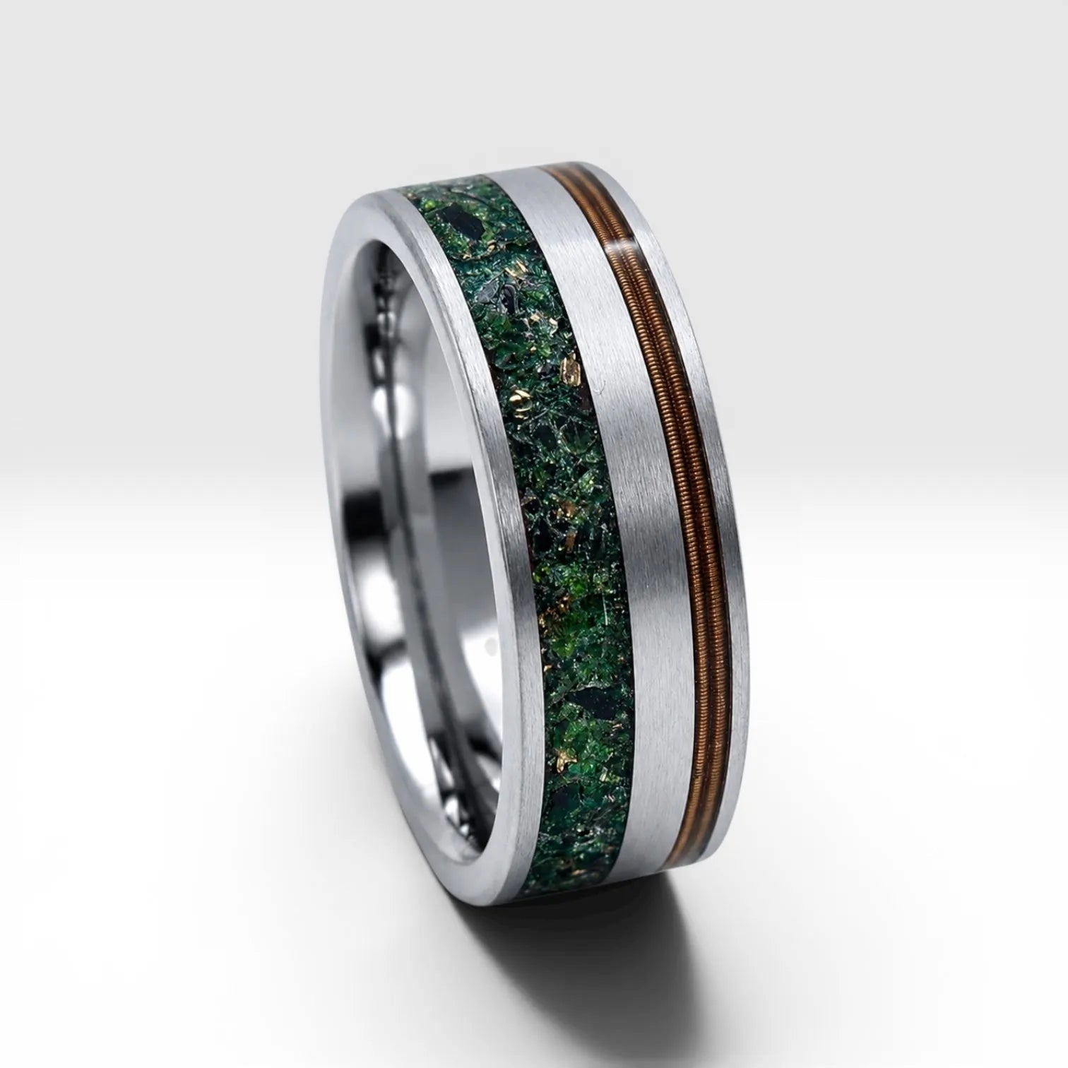 Tungsten ring with bronze guitar string and green goldstone inlay, dual channel design with satin finish