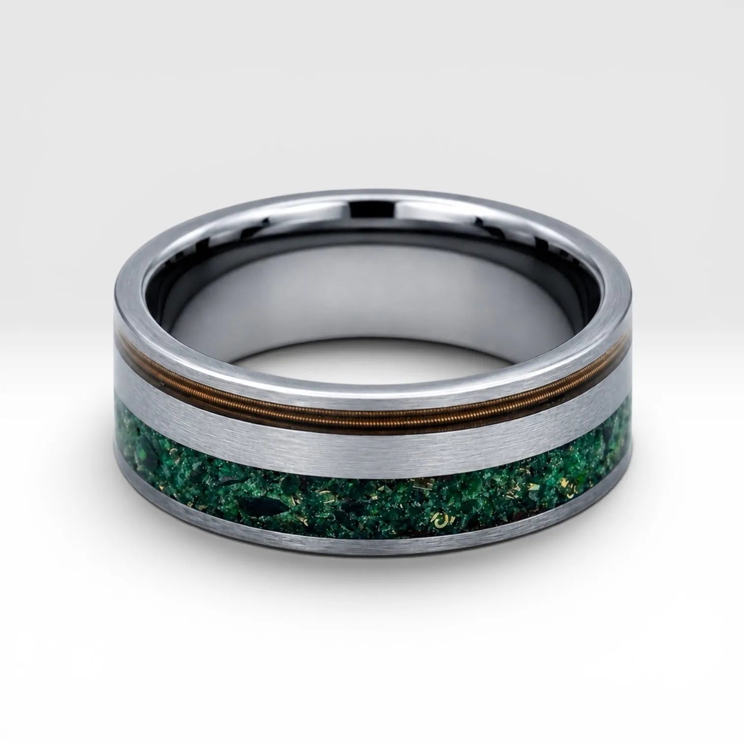 Tungsten ring with bronze guitar string and green goldstone inlay, dual channel design with satin finish