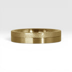 4mm gold women's wedding band featuring two-tone frosted finish and satin finish with architectural groove detail