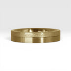 4mm gold women's wedding band featuring two-tone frosted finish and satin finish with architectural groove detail