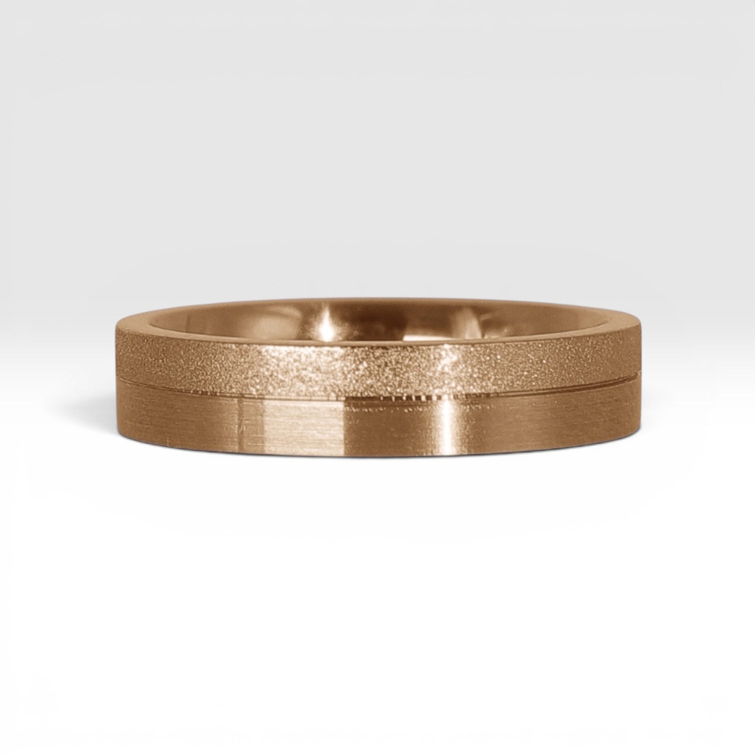 4mm rose gold women's wedding band featuring two-tone frosted finish and satin finish with architectural groove detail