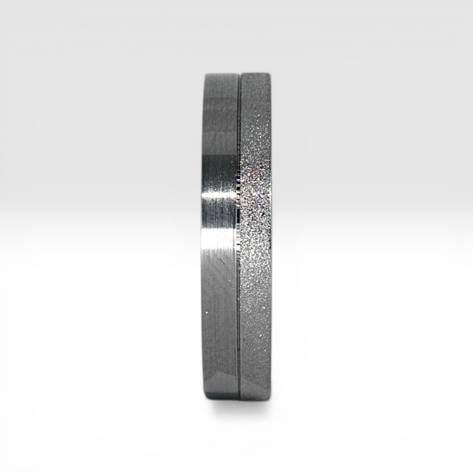 4mm titanium women's wedding band featuring two-tone frosted finish and satin finish with architectural groove detail