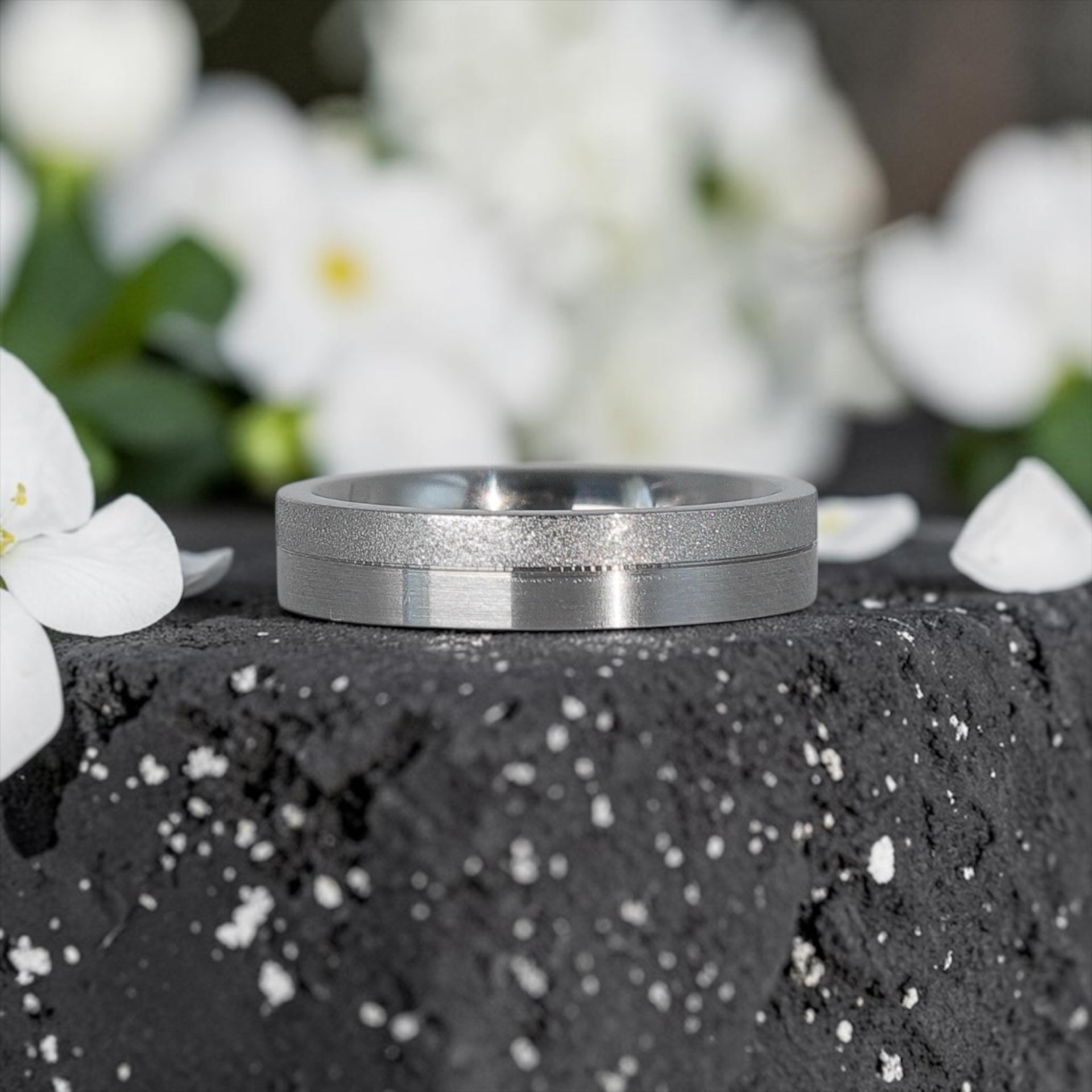 4mm titanium women's wedding band featuring two-tone frosted finish and satin finish with architectural groove detail