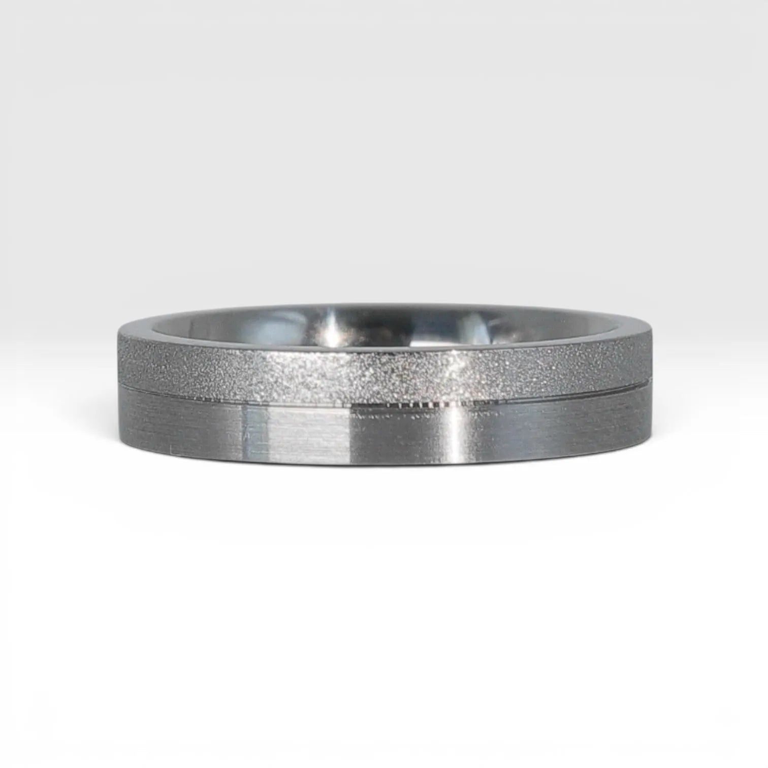 4mm women's wedding band featuring two-tone frosted finish and satin finish with architectural groove detail