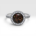 Resin gemstone ring with goldstone sparkle and lava opal shimmer set in sterling silver halo band