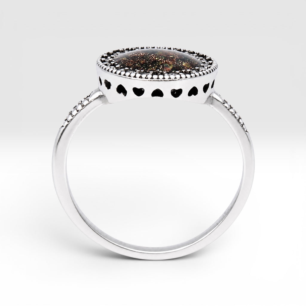 Resin gemstone ring with goldstone sparkle and lava opal shimmer set in sterling silver halo band