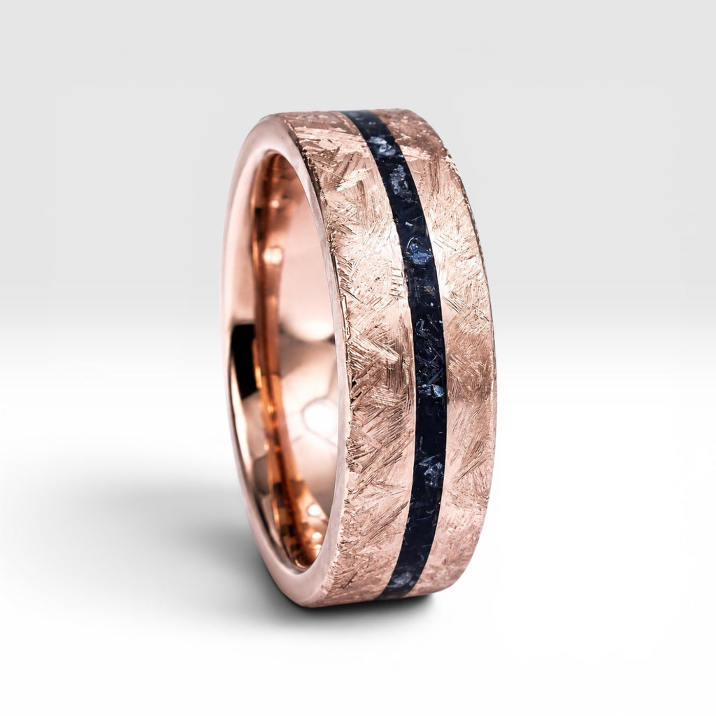 Emberfall rose gold ring featuring meteorite shavings, volcanic stone inlay, and a distressed forged finish handcrafted by Venus Rings.