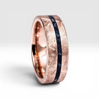 Emberfall rose gold ring featuring meteorite shavings, volcanic stone inlay, and a distressed forged finish handcrafted by Venus Rings.