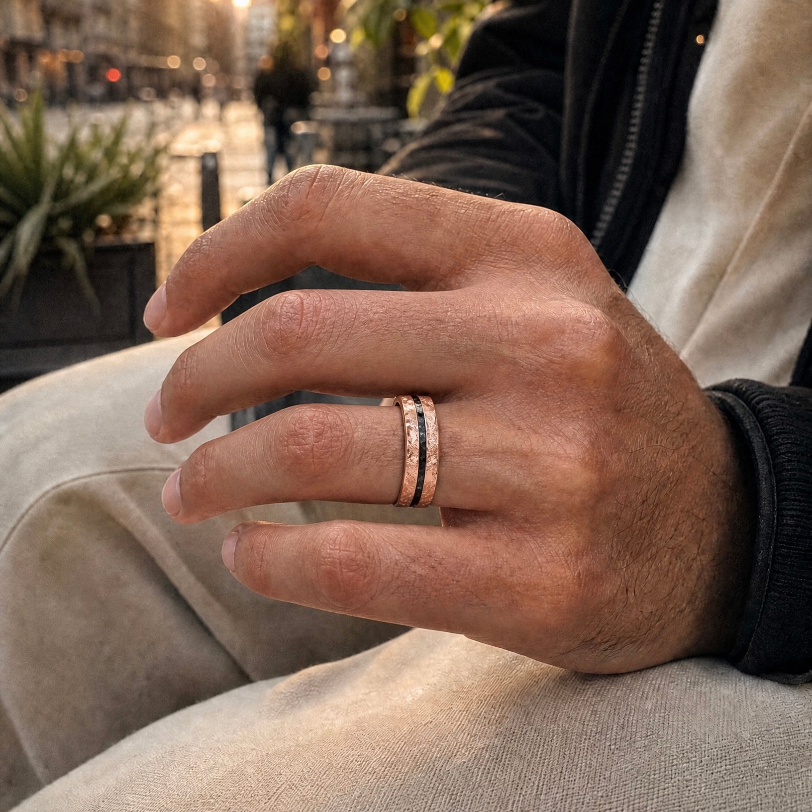 Emberfall rose gold ring featuring meteorite shavings, volcanic stone inlay, and a distressed forged finish handcrafted by Venus Rings.