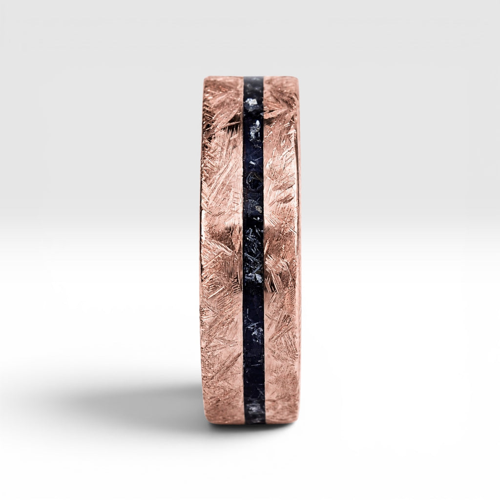 Emberfall rose gold ring featuring meteorite shavings, volcanic stone inlay, and a distressed forged finish handcrafted by Venus Rings.