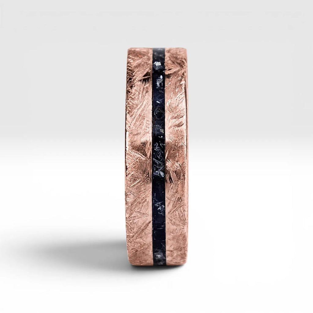 Emberfall rose gold ring featuring meteorite shavings, volcanic stone inlay, and a distressed forged finish handcrafted by Venus Rings.
