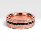 Emberfall rose gold ring featuring meteorite shavings, volcanic stone inlay, and a distressed forged finish handcrafted by Venus Rings.