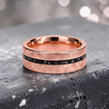 Emberfall rose gold ring featuring meteorite shavings, volcanic stone inlay, and a distressed forged finish handcrafted by Venus Rings.