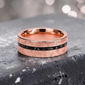 Emberfall rose gold ring featuring meteorite shavings, volcanic stone inlay, and a distressed forged finish handcrafted by Venus Rings.