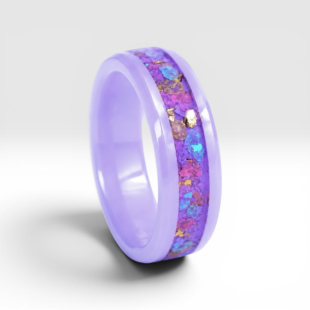 Fairybloom purple ceramic ring featuring real pressed flower petals, iridescent accents, and gold flakes preserved in a handcrafted floral inlay.