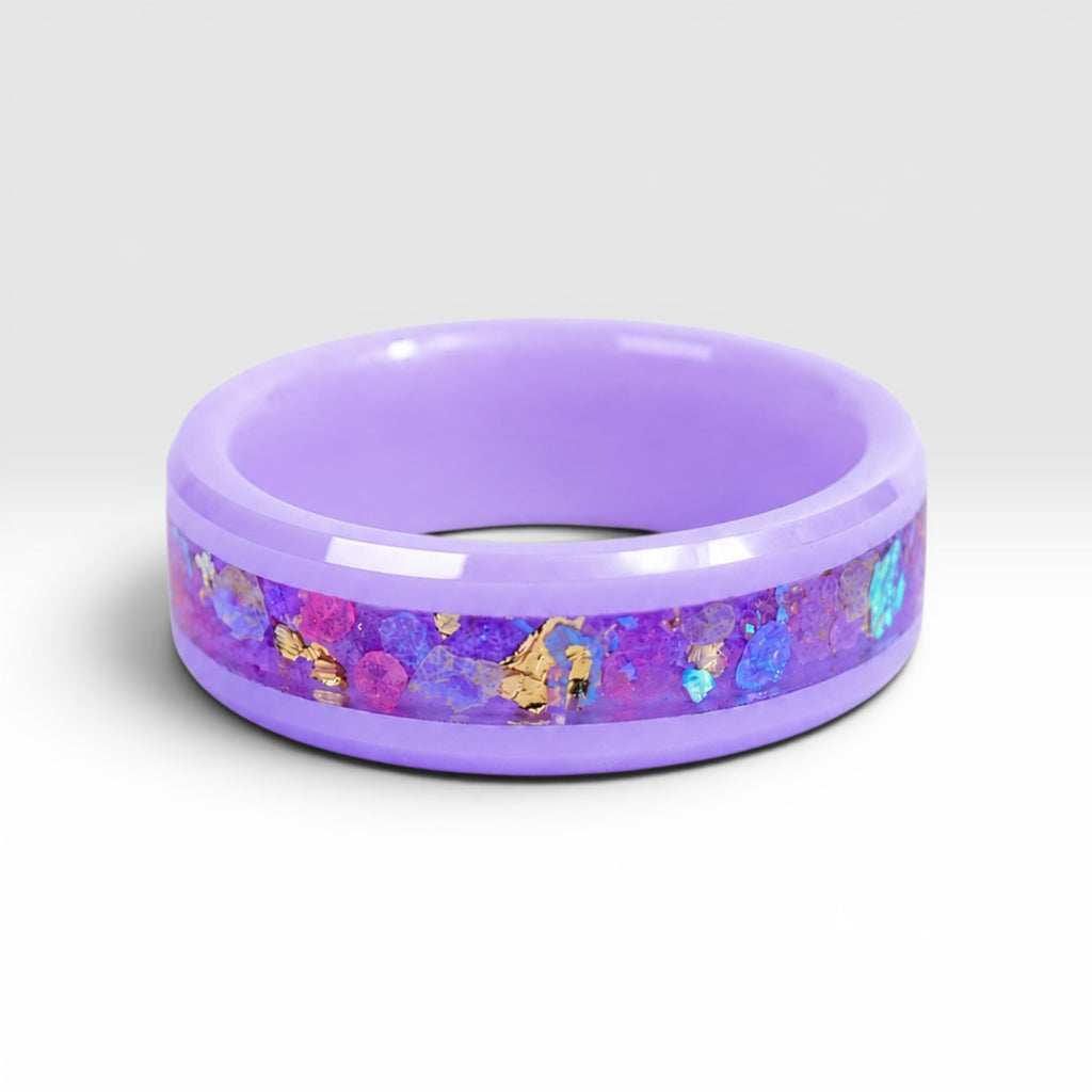 Fairybloom purple ceramic ring featuring real pressed flower petals, iridescent accents, and gold flakes preserved in a handcrafted floral inlay.