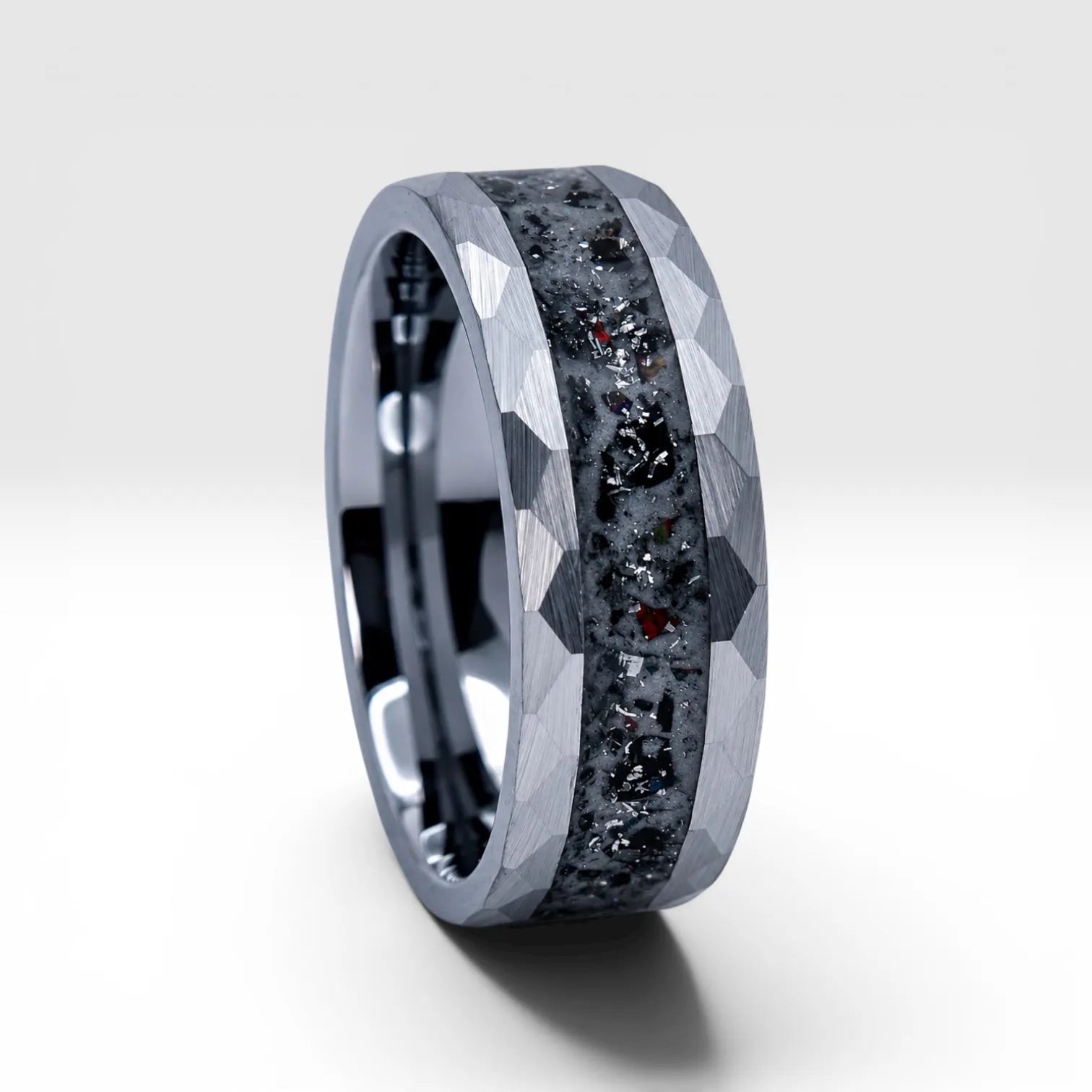 Tungsten ring with meteorite, lava opal and shungite inlay, faceted band with red glow in the dark effect