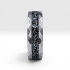 Tungsten ring with meteorite, lava opal and shungite inlay, faceted band with red glow in the dark effect