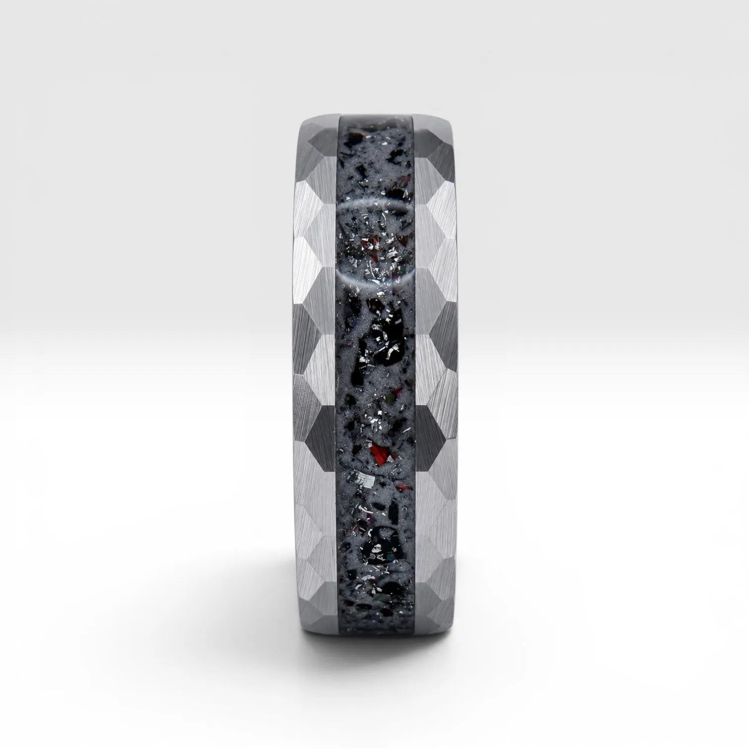 Tungsten ring with meteorite, lava opal and shungite inlay, faceted band with red glow in the dark effect