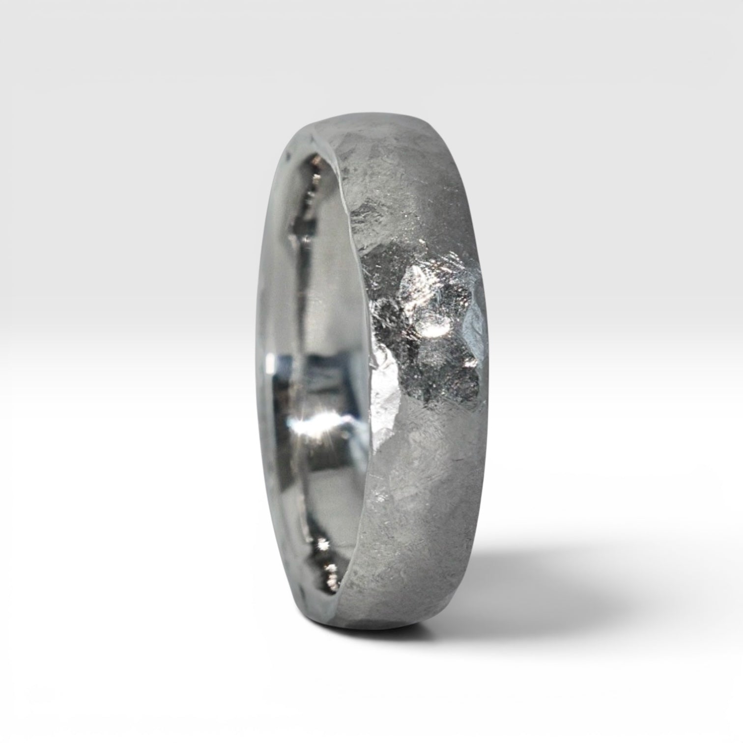 4mm domed titanium women's wedding band with hand-hammered finish, bold textured exterior with smooth comfort fit interior