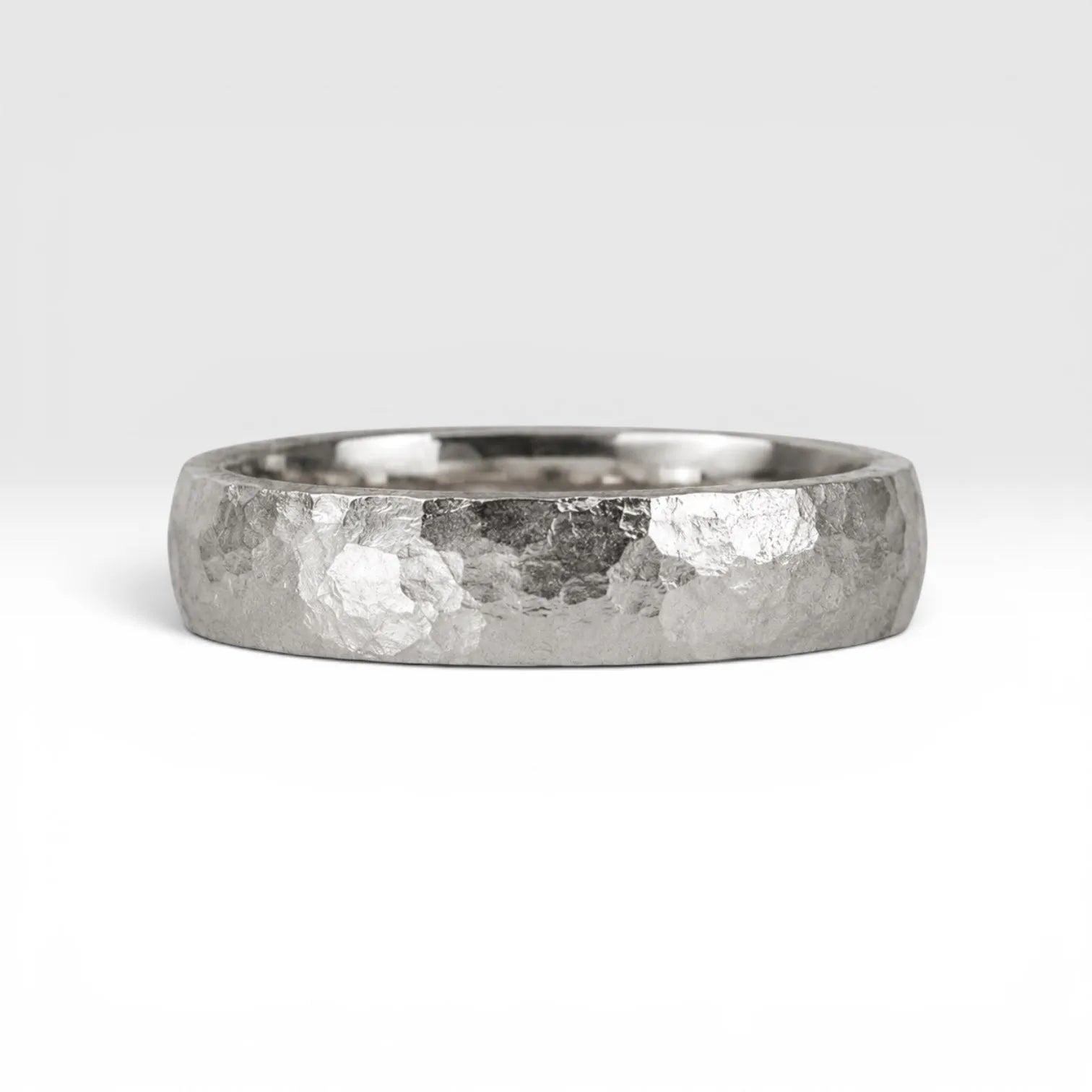 4mm domed women's wedding band with hand-hammered finish, bold textured exterior with smooth comfort fit interior