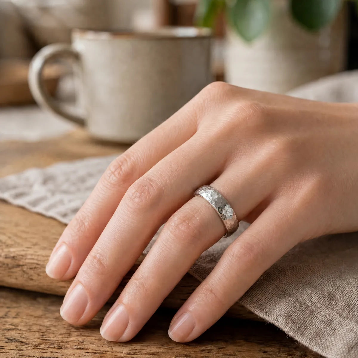 4mm domed women's wedding band with hand-hammered finish, bold textured exterior with smooth comfort fit interior