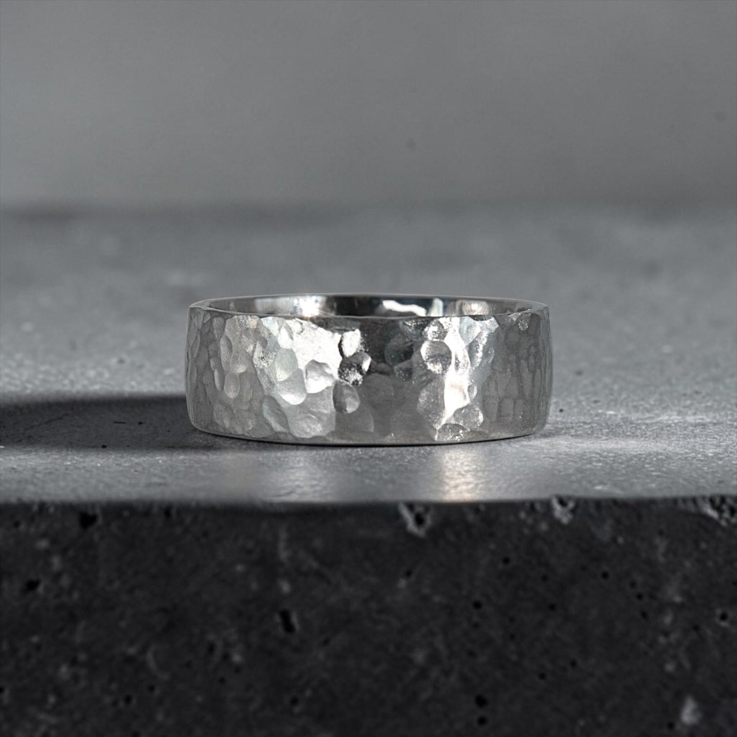 8mm domed men's wedding band with hand-hammered finish, bold textured exterior with smooth comfort fit interior